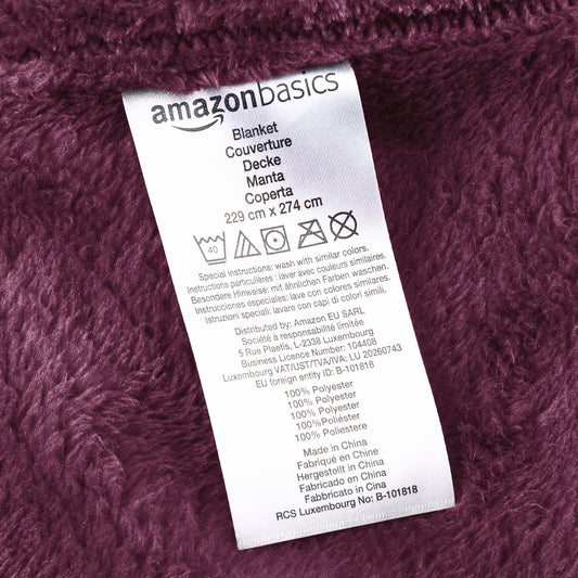 Amazon Basics Manta arrullo no calefactable, Hecha de Felpa de Terciopelo Suave, 168 x 229 cm, Color Berenjena